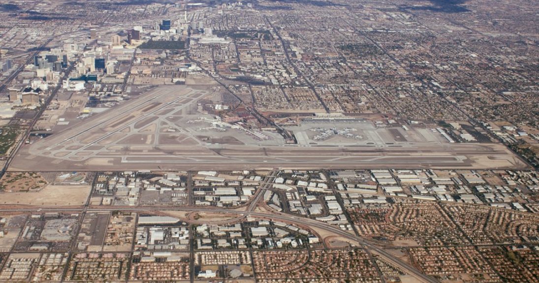 Why was Mccarran Airport name changed to Harry Reid?