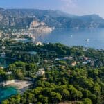 Coast of Saint-Jean-Cap-Ferrat, France with the mountains in the background