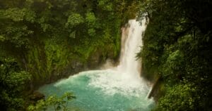 A waterfall in the middle of a forest in Costa Rica.