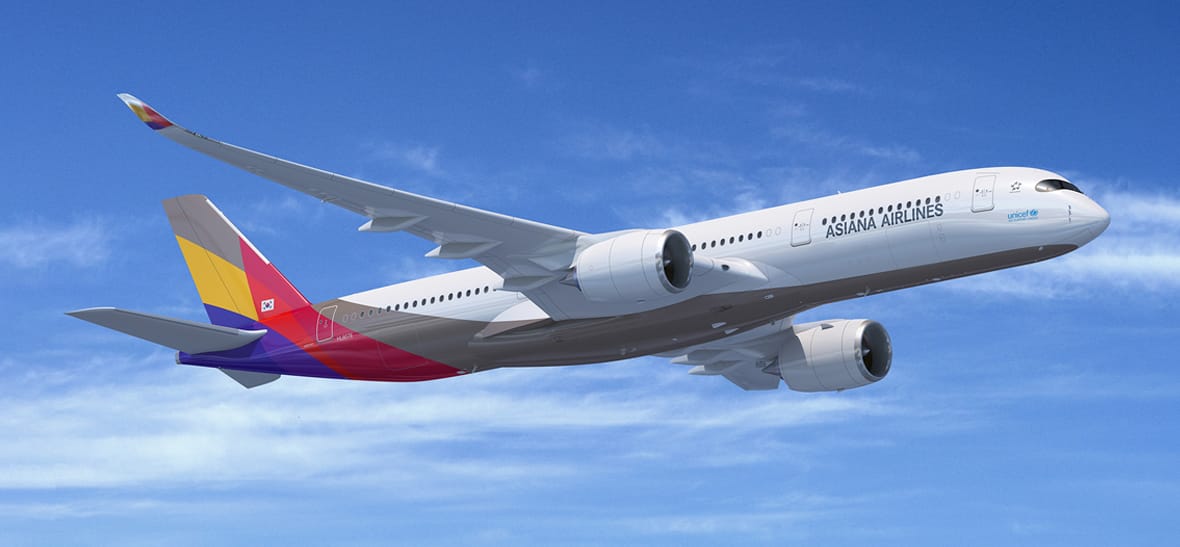 Asiana Airlines aircraft in the sky.