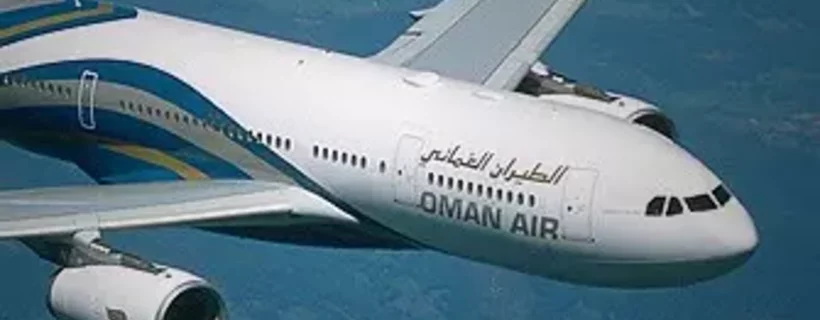 Oman Air aircraft in the sky.