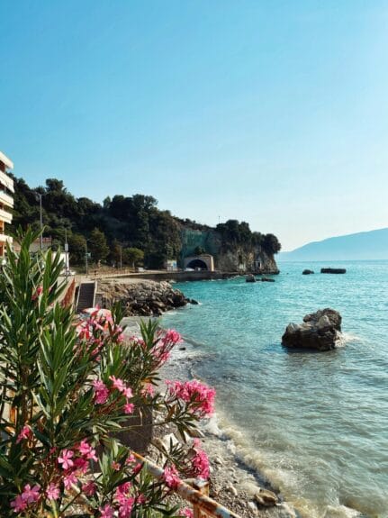 Mediterranean coastline with cliffs and clear water in Vlorë, Albania.